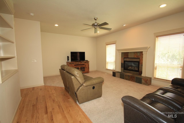 1491 N Millstream Ct, Nampa, ID 83686 - living area with ceiling fan, healthy amount of natural light, a fireplace, recessed lighting, and light wood-style floors