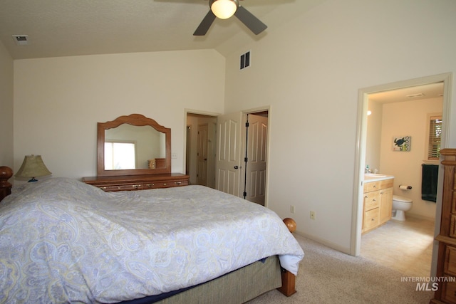 1491 N Millstream Ct, Nampa, ID 83686 - bedroom with high vaulted ceiling, light carpet, ensuite bathroom, and ceiling fan