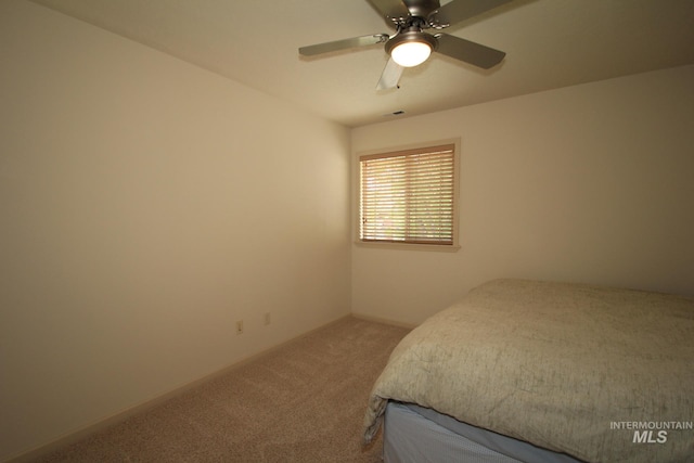 1491 N Millstream Ct, Nampa, ID 83686 - bedroom with carpet floors and a ceiling fan