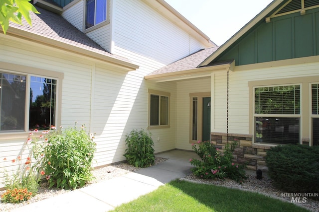 1491 N Millstream Ct, Nampa, ID 83686 - entrance to property featuring roof with shingles and board and batten siding
