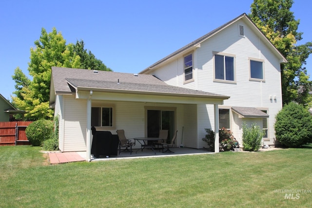 1491 N Millstream Ct, Nampa, ID 83686 - rear view of property featuring a patio and a lawn