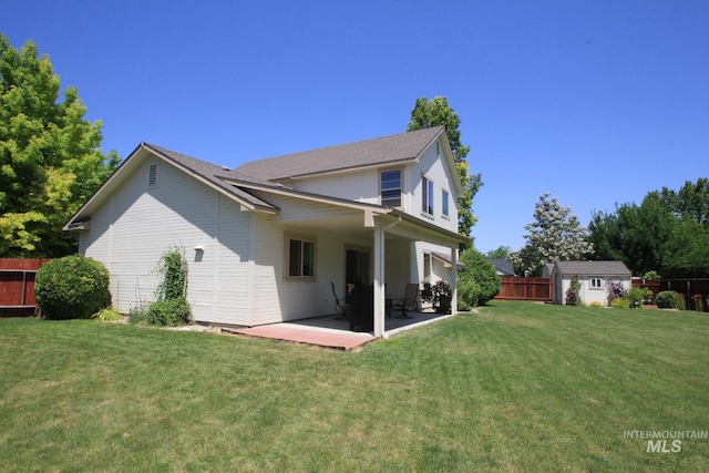 1491 N Millstream Ct, Nampa, ID 83686 - rear view of property featuring a patio and a storage shed