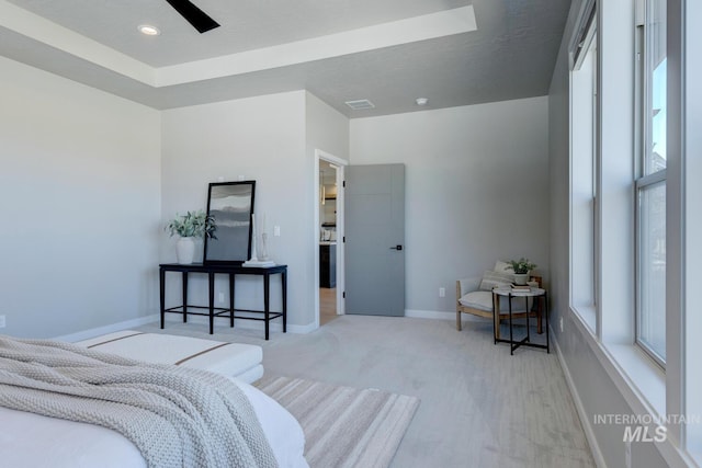 bedroom featuring visible vents, ceiling fan, a textured ceiling, and baseboards