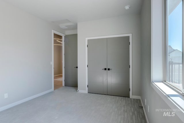 unfurnished bedroom with baseboards