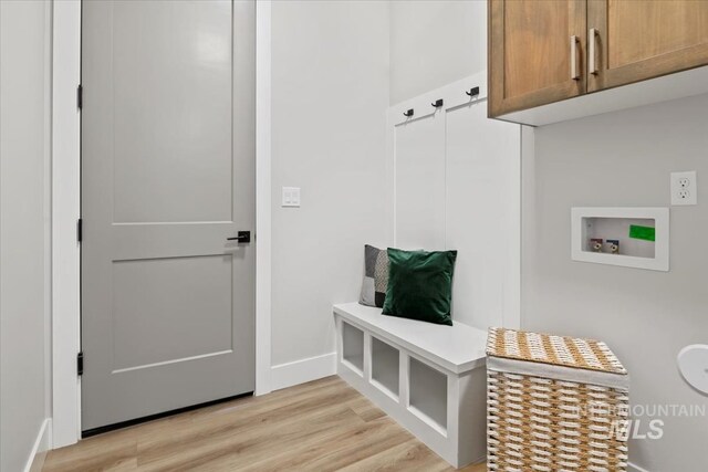 8469 W Happy Day Dr, Meridian, ID 83646 - mudroom featuring light wood finished floors and baseboards