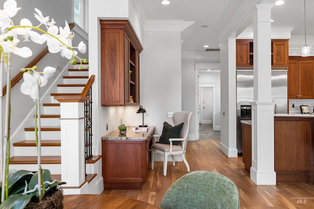 876 E Pennsylvania Ln, Boise, ID 83706 - bar with ornate columns, decorative backsplash, wood finished floors, recessed lighting, and stairs