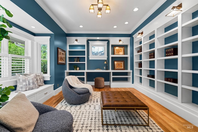876 E Pennsylvania Ln, Boise, ID 83706 - living area with crown molding, wood finished floors, built in features, recessed lighting, and baseboards