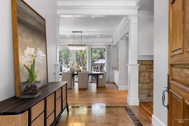 876 E Pennsylvania Ln, Boise, ID 83706 - foyer entrance featuring ornate columns, inlaid floor details, ornamental molding, recessed lighting, and wood finished floors