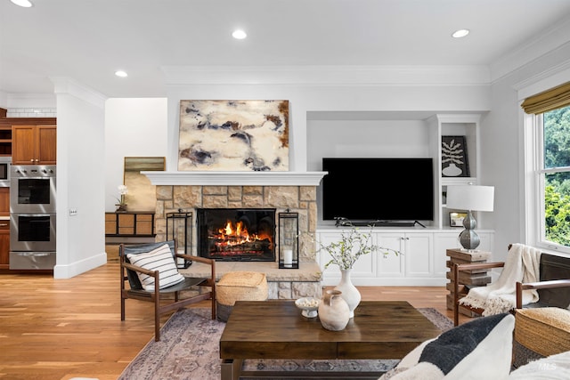 876 E Pennsylvania Ln, Boise, ID 83706 - living area featuring a fireplace, light wood-style flooring, ornamental molding, and recessed lighting