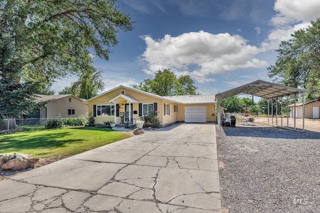 1395 W 3rd St, Weiser, ID 83672 - ranch-style house featuring a garage, driveway, and a carport