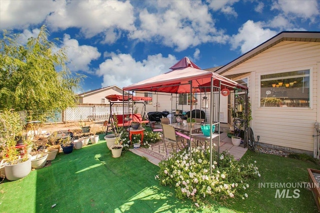 view of yard with a gazebo and a patio area