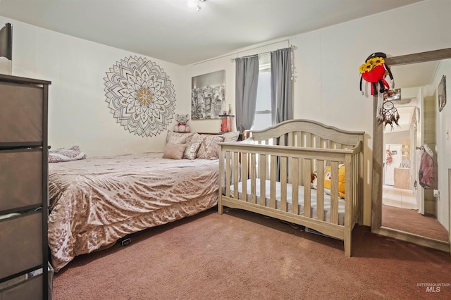 bedroom featuring carpet