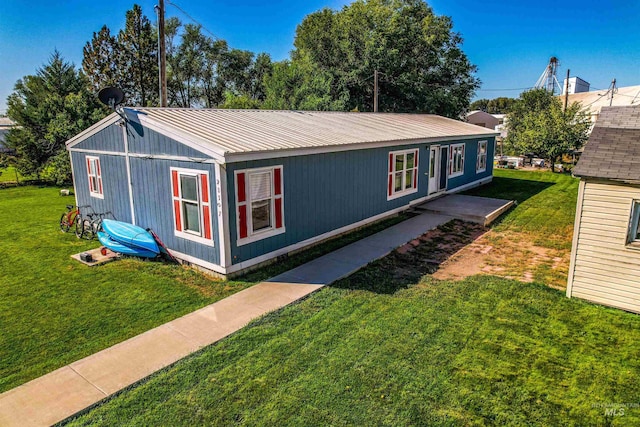 exterior space with a lawn