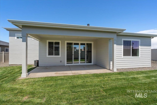 11101 W Campanula Ct, Star, ID 83669 - rear view of property with a patio area, a lawn, and central air condition unit