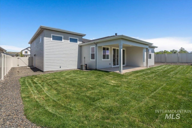 11101 W Campanula Ct, Star, ID 83669 - back of house featuring a patio, cooling unit, and a gate