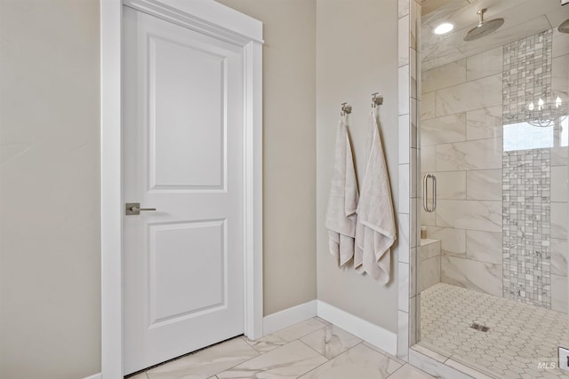 129 E 33 S, Burley, ID 83318 - bathroom featuring marble finish floor, baseboards, and a shower stall