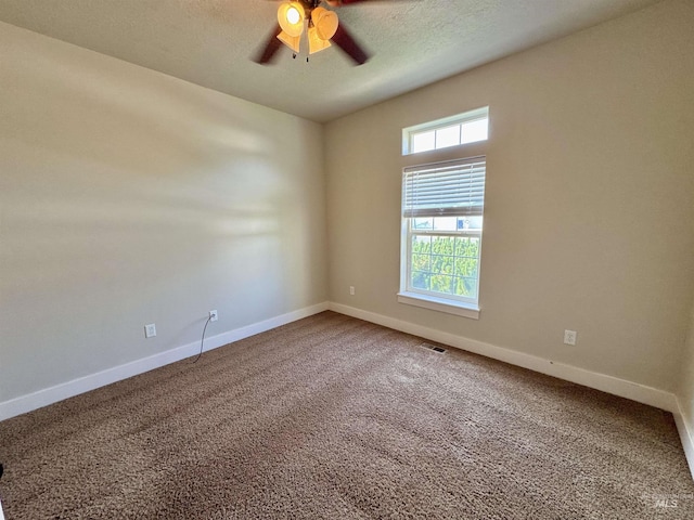 2577 Longbow Dr, Twin Falls, ID 83301 - empty room with healthy amount of natural light, ceiling fan, and carpet floors