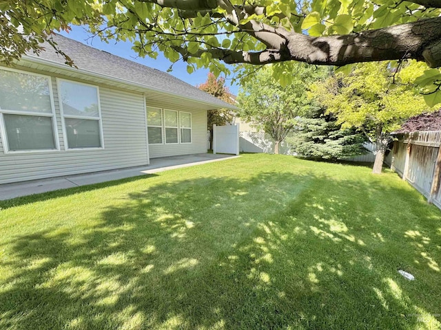 2577 Longbow Dr, Twin Falls, ID 83301 - fenced backyard with a patio