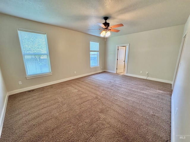 2577 Longbow Dr, Twin Falls, ID 83301 - carpeted spare room with a textured ceiling and a ceiling fan