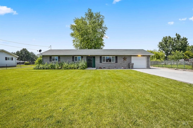 ranch-style home with a garage and a front yard