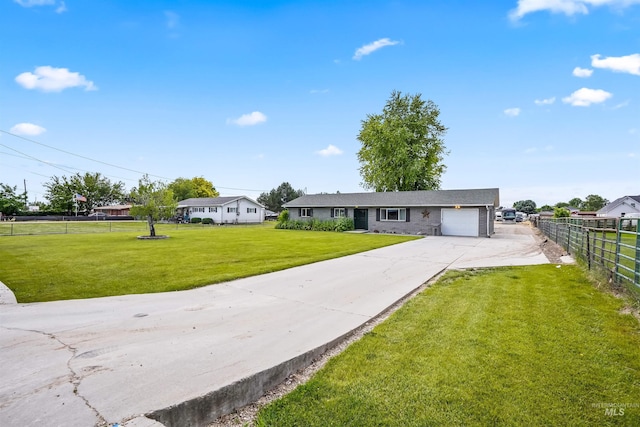 single story home featuring a front yard and a garage