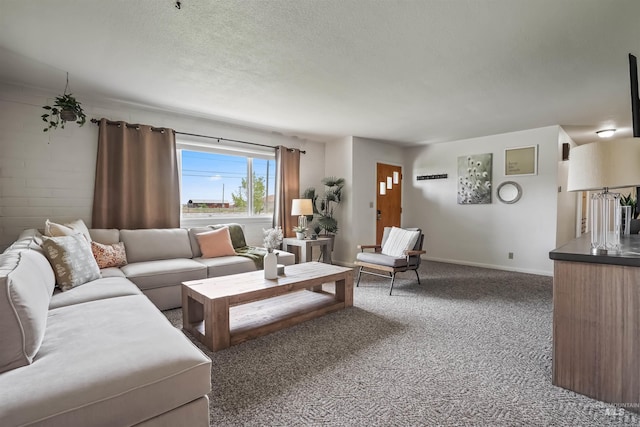 carpeted living room with a textured ceiling