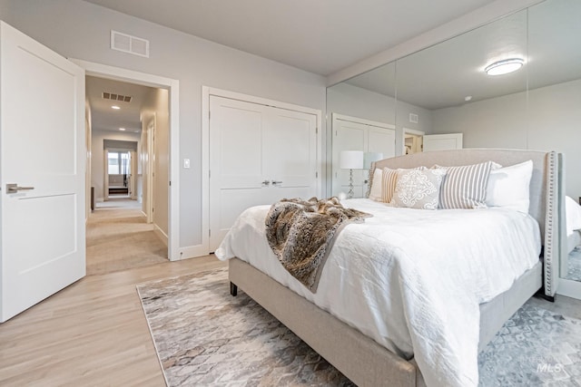 bedroom featuring light wood-type flooring