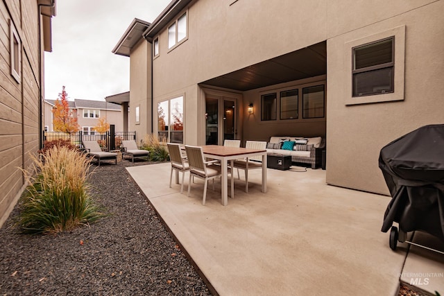 view of patio / terrace with an outdoor hangout area and grilling area