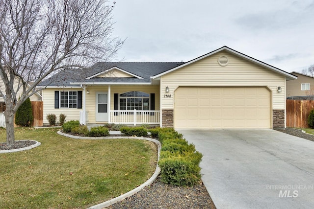 single story home with a porch, a garage, and a front lawn