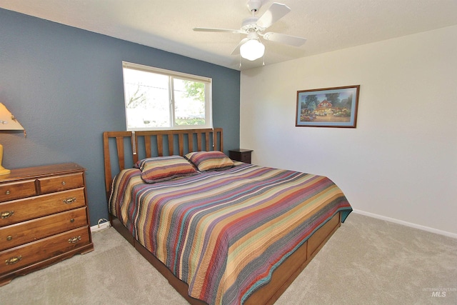 2155 N 24th St, Boise, ID 83702 - bedroom featuring light carpet, baseboards, and a ceiling fan