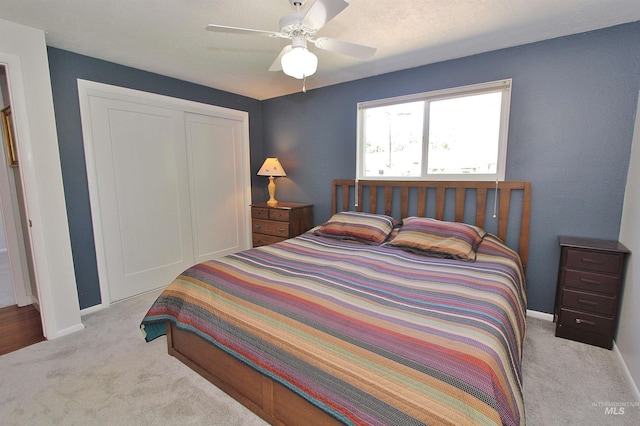 2155 N 24th St, Boise, ID 83702 - carpeted bedroom with baseboards, a closet, and ceiling fan
