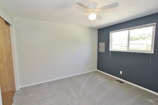 2155 N 24th St, Boise, ID 83702 - unfurnished room with light carpet, ceiling fan, and baseboards