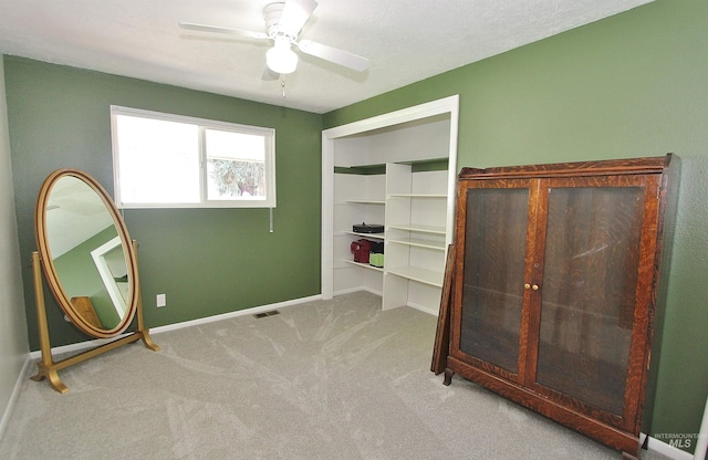 2155 N 24th St, Boise, ID 83702 - unfurnished bedroom with carpet flooring, baseboards, ceiling fan, and a closet