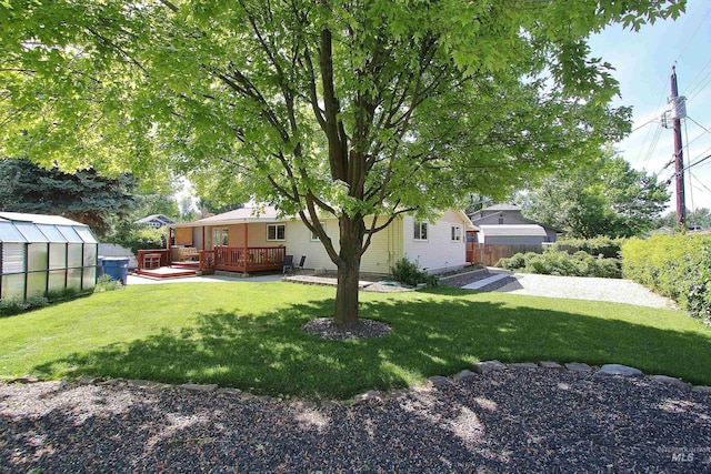 2155 N 24th St, Boise, ID 83702 - view of yard featuring an exterior structure, an outdoor structure, and a wooden deck