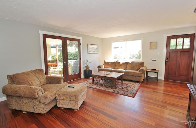 2155 N 24th St, Boise, ID 83702 - living area with wood finished floors, french doors, and baseboards