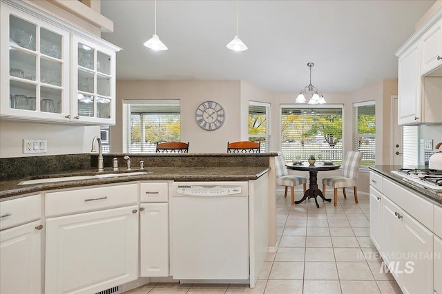 kitchen with white cabinetry, dishwasher, sink, and pendant lighting