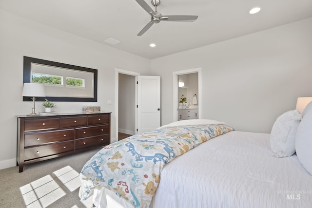 carpeted bedroom featuring ceiling fan, recessed lighting, visible vents, and baseboards