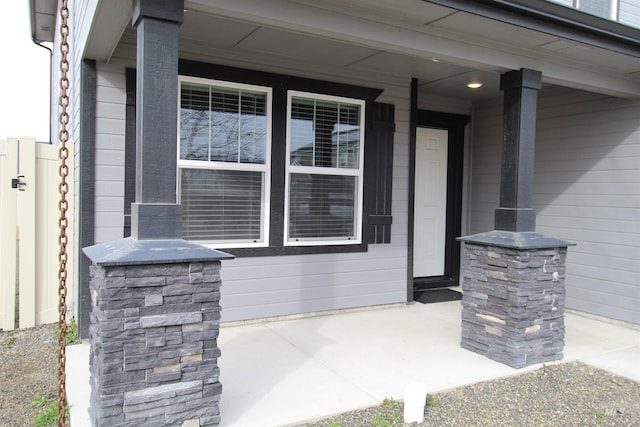 view of patio featuring a porch