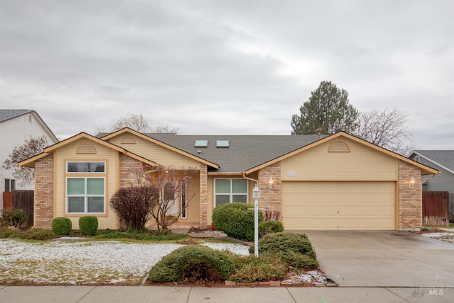 ranch-style house featuring a garage