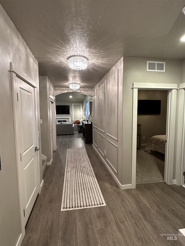 hallway featuring dark hardwood / wood-style floors