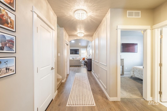 hallway with carpet flooring