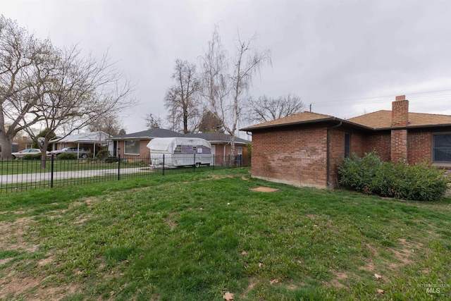 view of yard featuring fence
