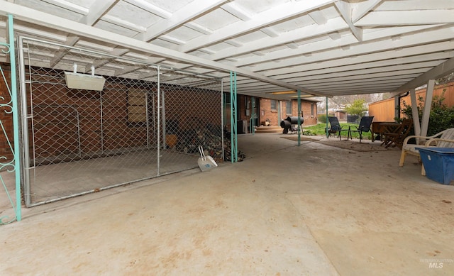 exterior space featuring unfinished concrete floors
