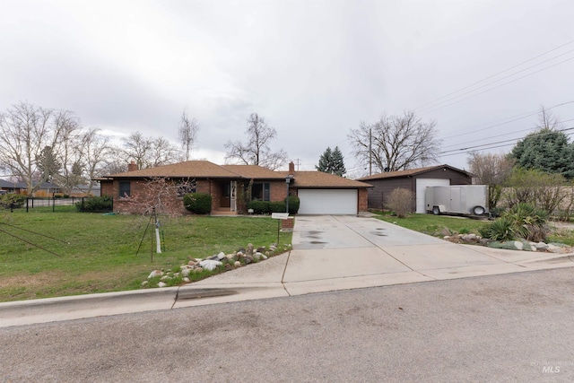 ranch-style house with a front yard, fence, brick siding, a chimney, and driveway