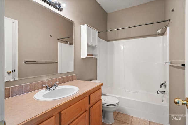 bathroom featuring toilet, shower / tub combination, tile patterned flooring, and vanity