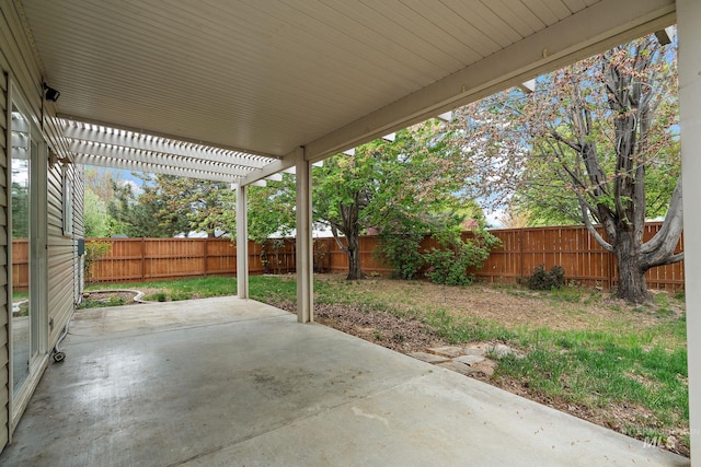 view of patio / terrace featuring a pergola and a fenced backyard