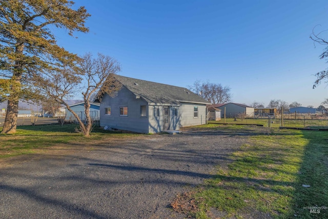 exterior space with a yard