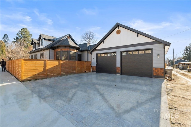 view of front of property featuring a garage