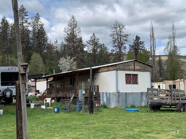 view of shed / structure featuring a yard