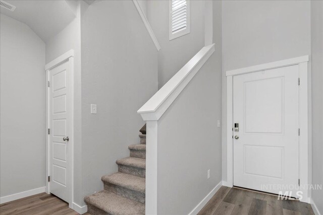 4953 W Apgar St, Meridian, ID 83646 - staircase featuring wood finished floors and baseboards
